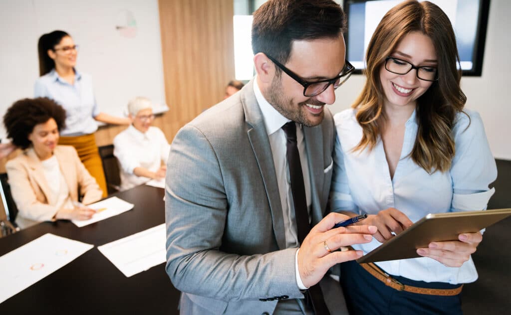 successful business team working at a Stamford IT company